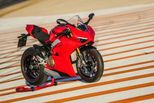 red and black sports bike